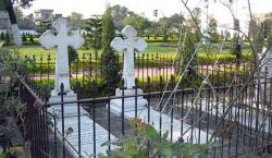 Restored graves at Holy Trinity Chapel, an Armenian church and cemetery built in 1867, in the Tangra district of Calcutta. (Leonard M.Apcar-International Herald Tribune) (medium)